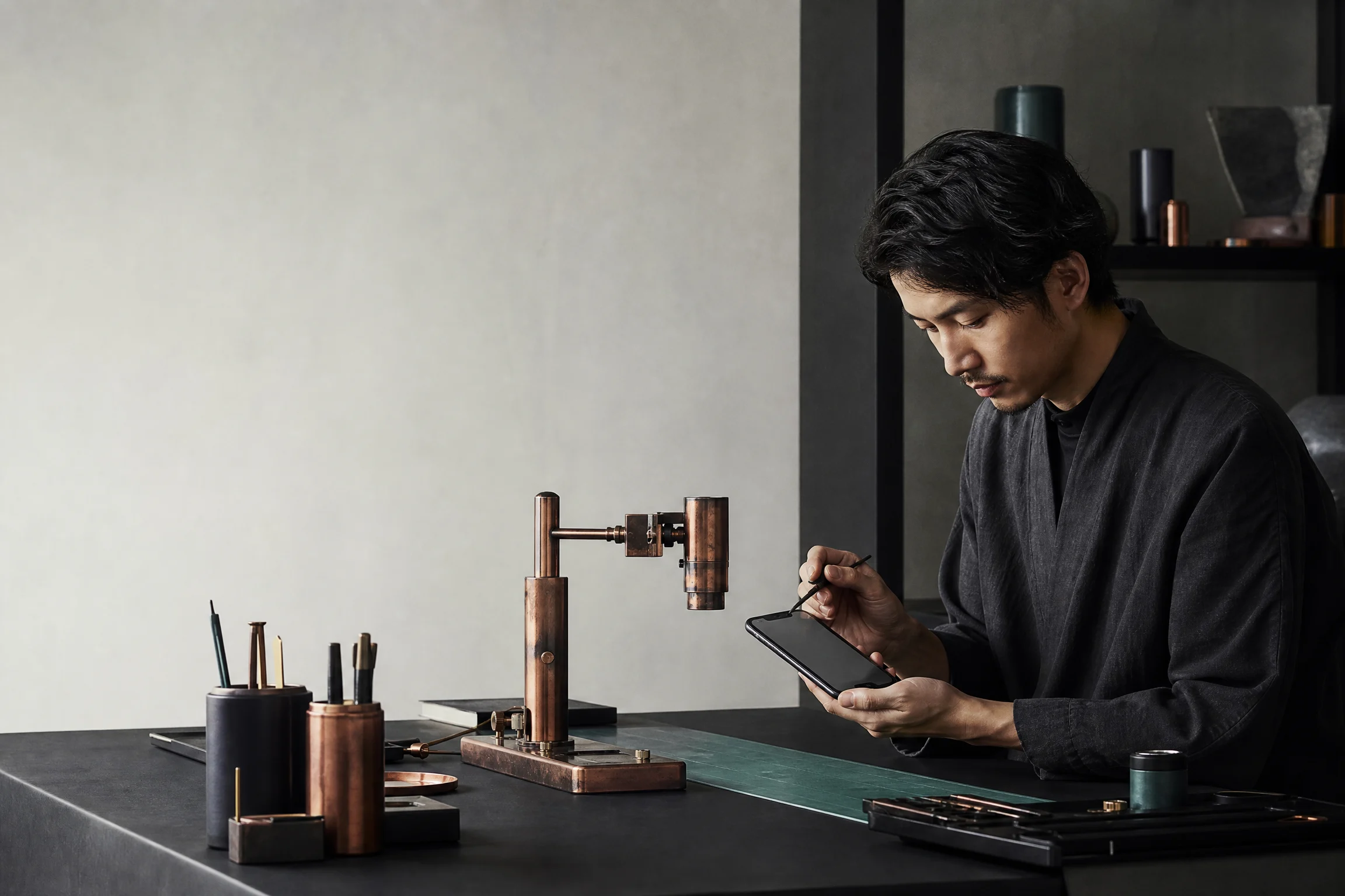 Mobile product designer tuning a phone in a quiet studio